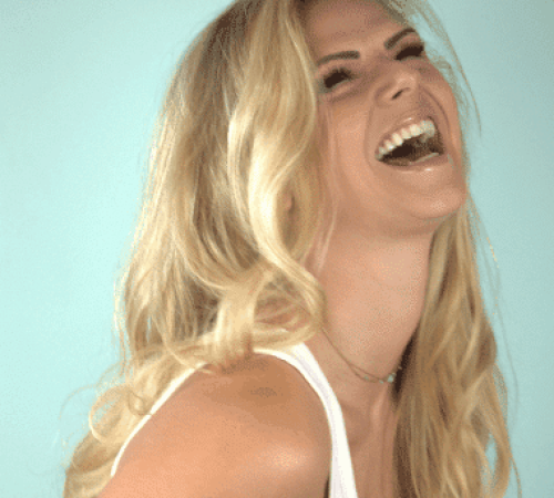 Aly Cutter -laughing headshot - Aly Cutter