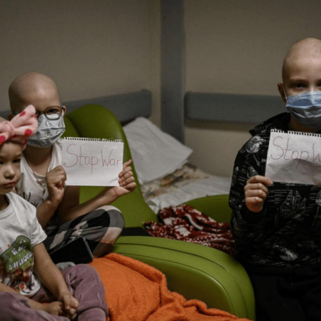 Children with stop war signs (1)